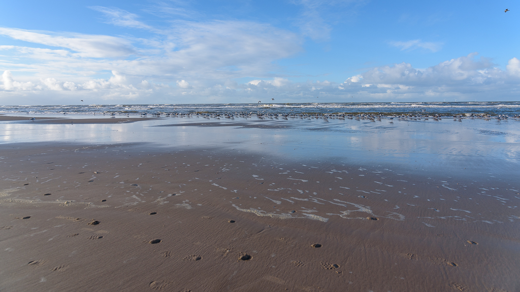 reflectie op het strand